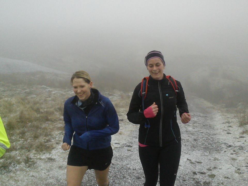 Karen and I running in the snow up the Ochils. Of course I'm wearing shorts, what else?!