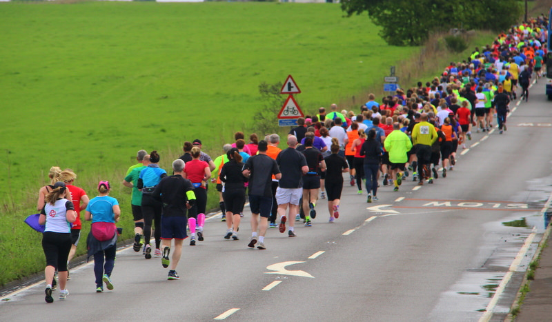 Runners taking over the road on the way out of Kinross. As we do :)