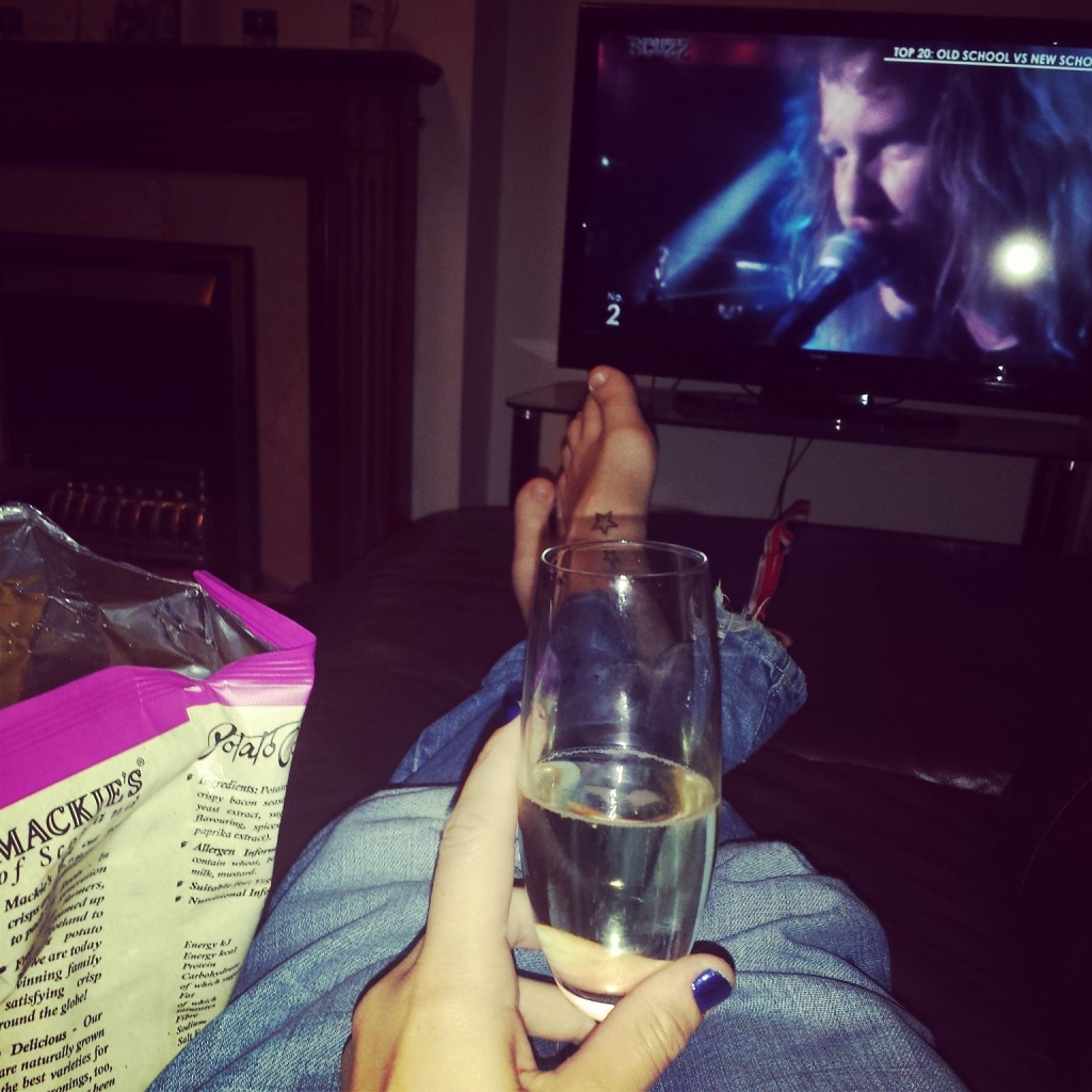 Fizz, crisps and TV. Perfect.