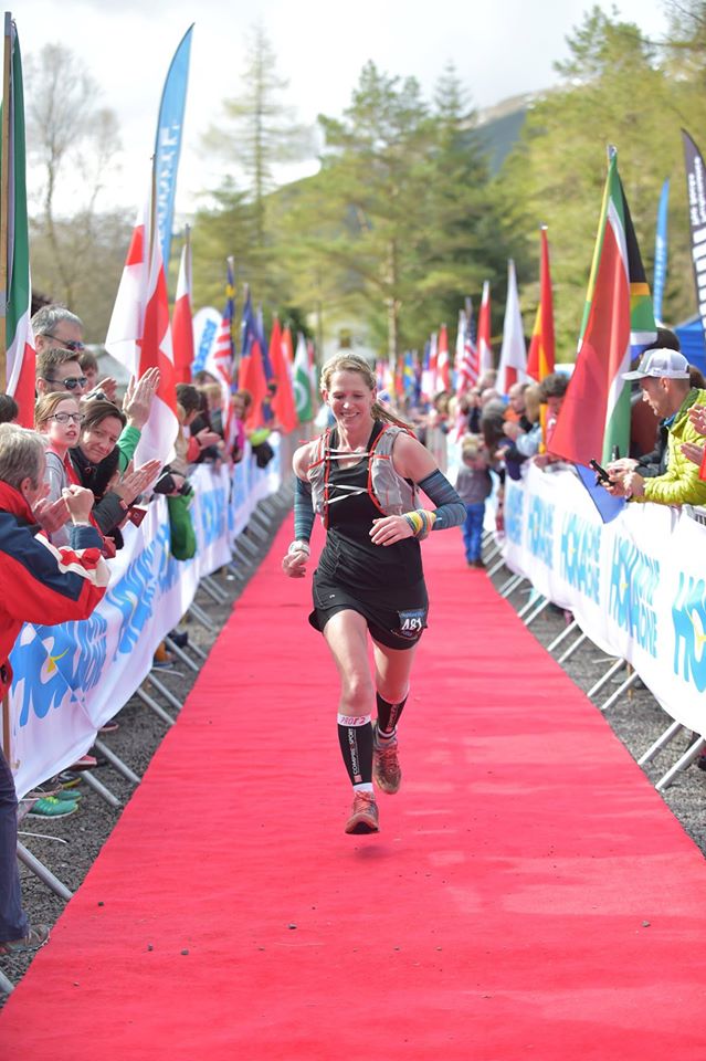 A strong finish line sprint and a grin that says it all. Thanks for the cheers Ruth!! Photo - Monument photos